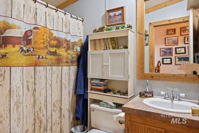Full bathroom featuring vanity and a shower with shower curtain | Image 22