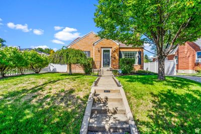 View of front of home with a front lawn | Image 1