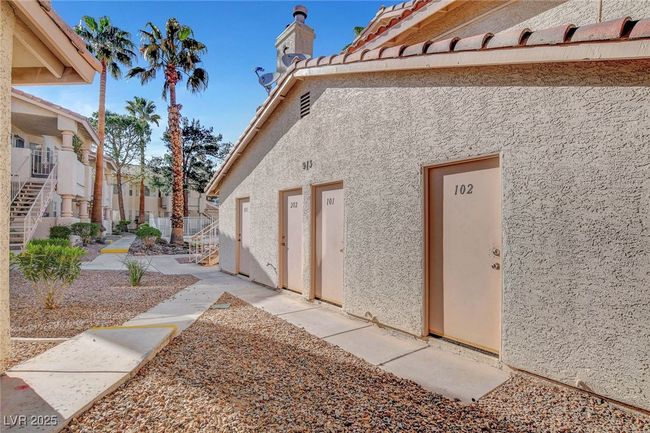 View of property exterior featuring stucco siding | Image 34