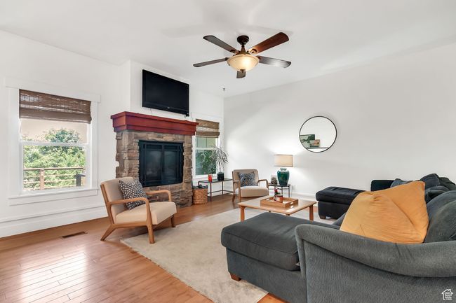 Main level living room with gas fireplace | Image 18
