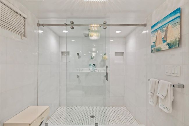Full bath featuring a stall shower | Image 22