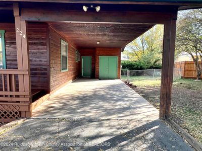 Carport with storage closet | Image 2