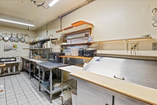 Large Galley style kitchen all equipment included, all sold as is. | Image 13