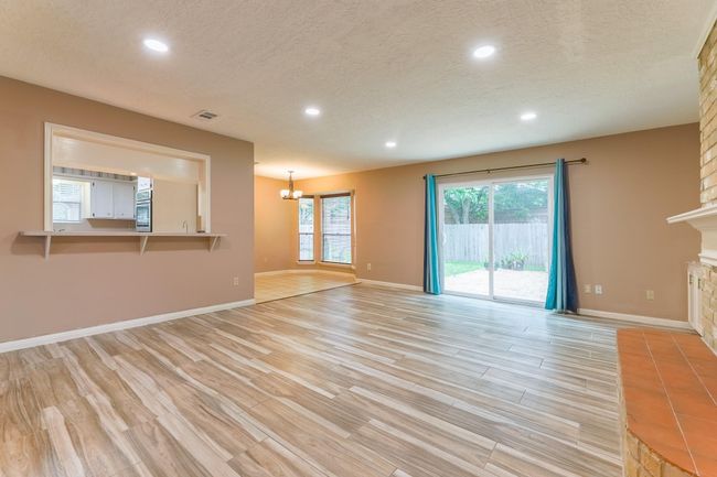 Kitchen is open to the living area | Image 9