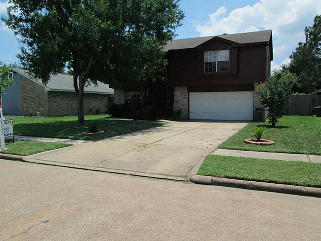 Nice deep double wide driveway for lots of parking. Nice shade tree in front yard and apple tree in back yard | Image 18