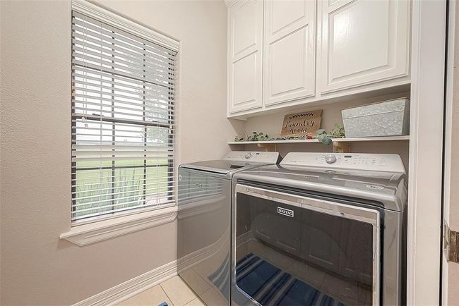 Good sized laundry room | Image 19