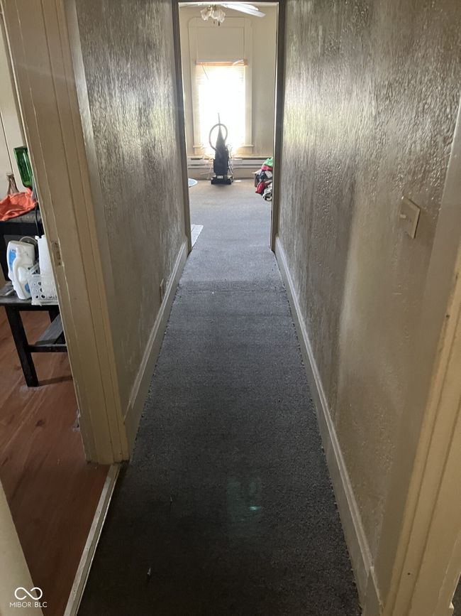 corridor with carpet floors | Image 11