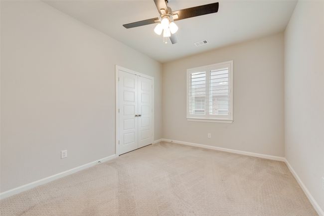 Unfurnished bedroom featuring visible vents, light carpet, and baseboards | Image 22