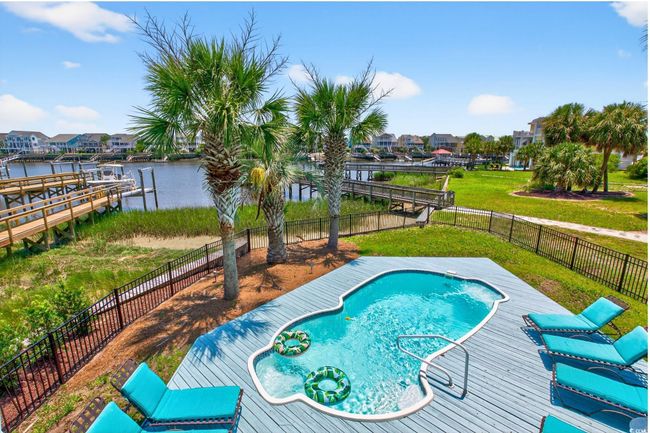 View of pool with a water view and a residential view | Image 15