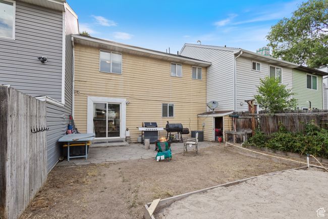 Rear view of property featuring a patio and a fenced backyard | Image 20