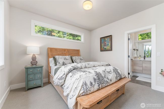 Two additional luxurious en-suite bedrooms provide the ultimate comfort and privacy | Image 23