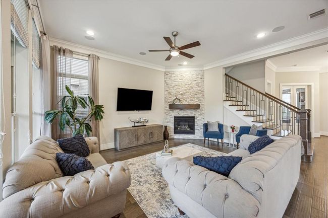 Recessed lighting throughout the house and modern light fixtures & fans. | Image 10