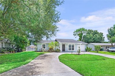 3171 Sw Crumpacker Street, House other with 2 bedrooms, 2 bathrooms and 1 parking in Port Saint Lucie FL | Image 2