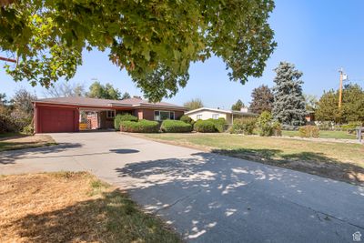 6516 S 2425 E, House other with 4 bedrooms, 2 bathrooms and 6 parking in Cottonwood Heights UT | Image 2