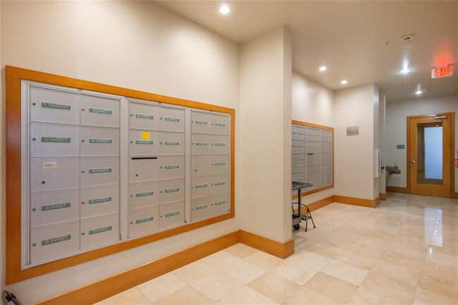 The mail is located in the hall behind the lobby! | Image 40