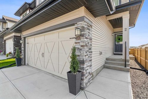 2 Belgian Crt, House with 3 bedrooms, 3 bathrooms and 4 parking in Cochrane AB | Card Image