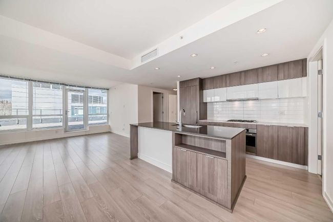 401 - 51 Waterfront Mews Sw, Home with 2 bedrooms, 2 bathrooms and 3 parking in Calgary AB | Image 5