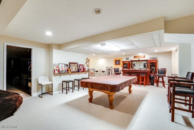 Game room featuring a bar, carpet, billiards table, and recessed lighting | Image 37