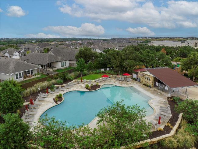 Pool featuring fence, a patio area, and a residential view | Image 29