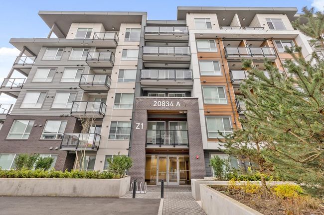 A404 - 20834 80 Avenue, Condo with 2 bedrooms, 2 bathrooms and 1 parking in Langley BC | Image 2