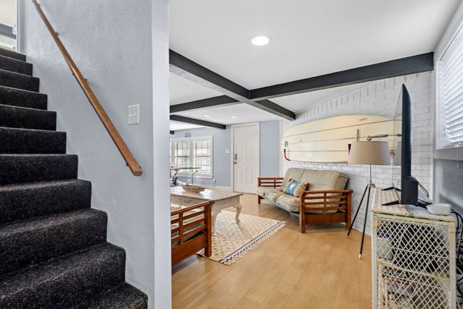 Downstairs great room provides additional entertainment space and sleeping arrangements. | Image 15
