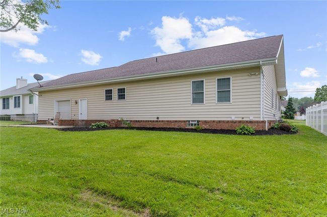 Back of house with a shingled roof | Image 42