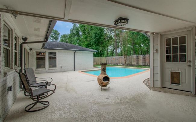 Large deck patio area plus extra wide 9' breezeway. Note the added ventilation to soffits that were replaced in 2020. | Image 40