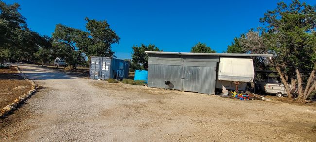 This building has been used for storage, could also be used as a garage for autos. | Image 13
