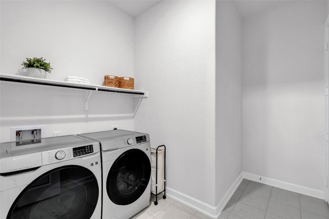 Washroom featuring light tile patterned floors and independent washer and dryer | Image 21