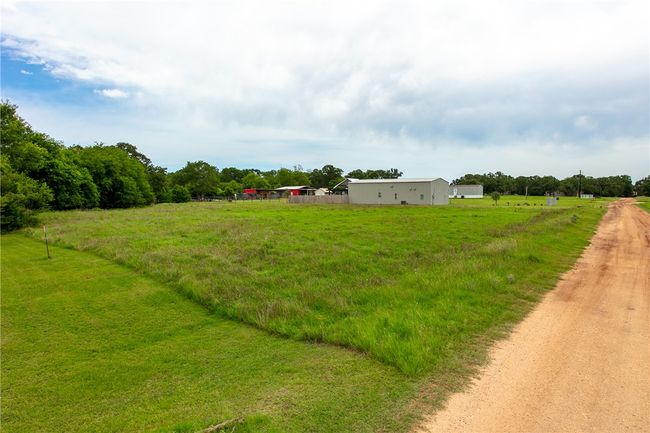 View of yard with a view of countryside | Image 9