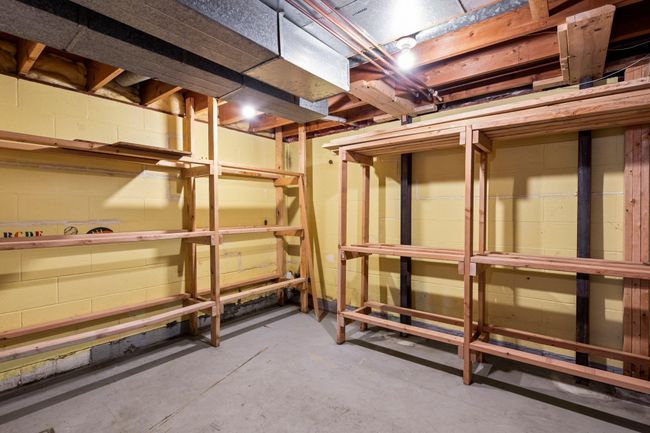A spacious basement offers ample storage or a great opportunity to create a finished living area. | Image 11