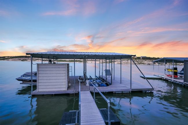 The private dock provides direct access to Lake Travis, making boating and water sports easily accessible even at low lake levels. | Image 7