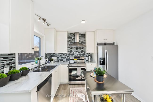 24 Mckeown Cres, House attached with 3 bedrooms, 2 bathrooms and 4 parking in Amherstview ON | Image 23