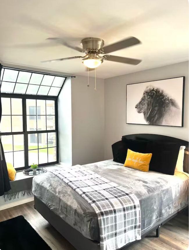 Bedroom featuring ceiling fan and wood-type flooring | Image 11