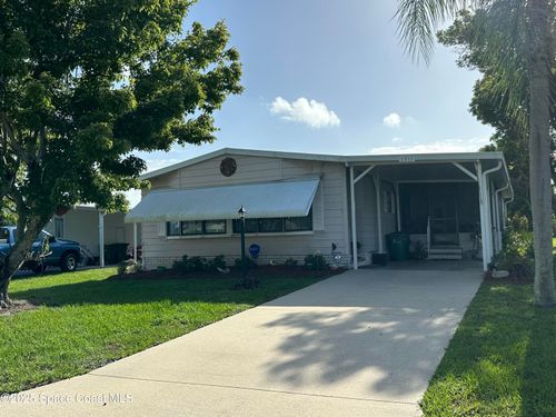 1311 Gardenia Dr, Barefoot Bay, FL, 32976-7642 | Card Image
