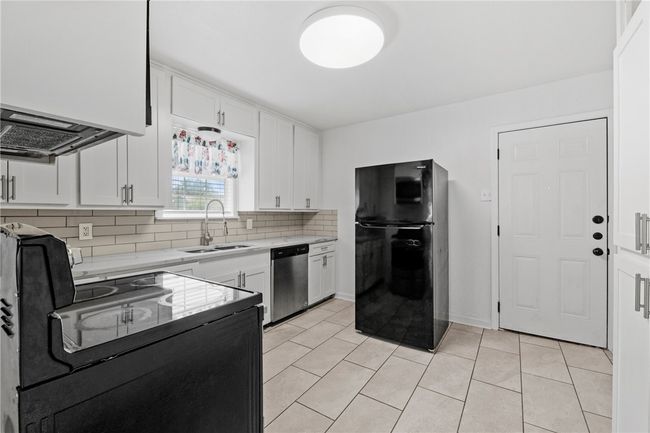 Kitchen with granite countertops | Image 6