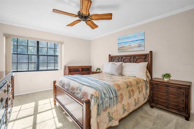 Spacious master suite privately located at rear of home with green views & no rear neighbors~ | Image 15