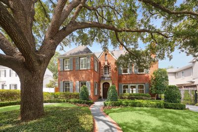 The majestic tree is situated perfectly on the front lawn providing shade and curb appeal. | Image 3