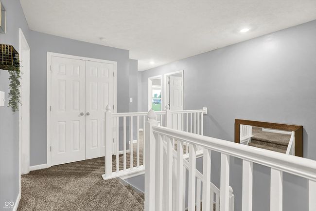 Stairs and hallway have brand new carpet. | Image 21