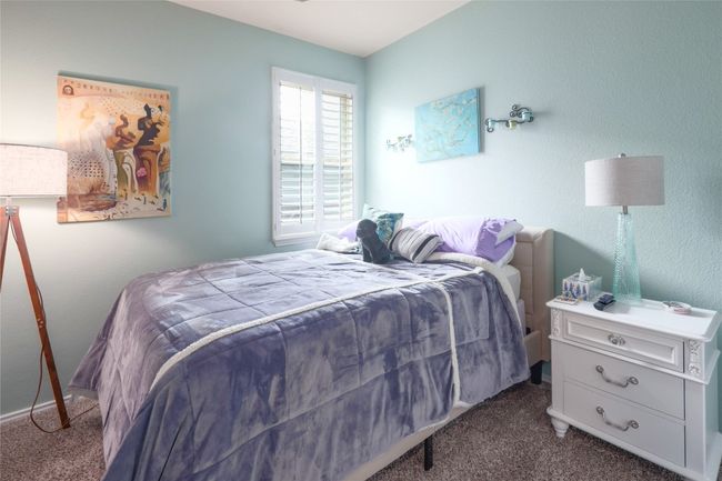 Bedroom with carpet floors | Image 20