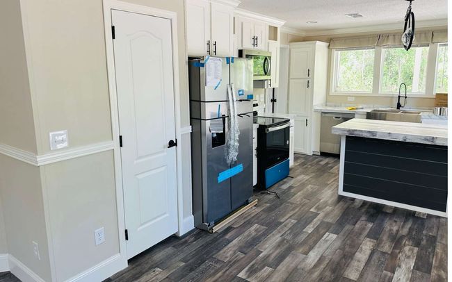 22904 112 Th Ter, House other with 3 bedrooms, 2 bathrooms and 3 parking in LIVE OAK FL | Image 5