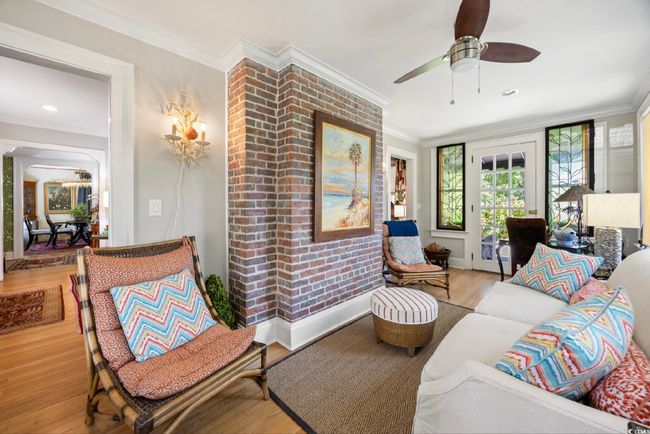 Living room featuring ornamental molding, wood finished floors, a ceiling fan, and recessed lighting | Image 29