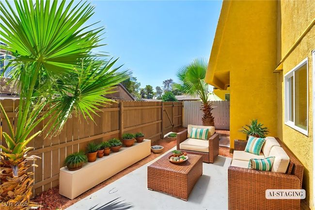 Fenced backyard with an outdoor living space and a patio | Image 7