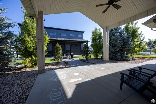 View of patio featuring a ceiling fan | Image 86
