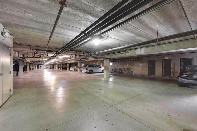 TWO assigned spots & storage in the parking garage | Image 31