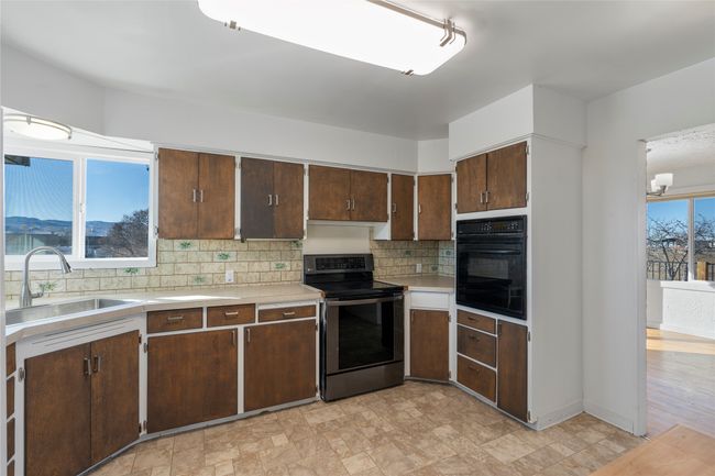 Spacious countertops provide plenty of prep space for cooking. | Image 37