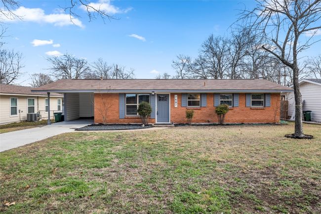 Well appointed home with new driveway, carport and landscaping | Image 4