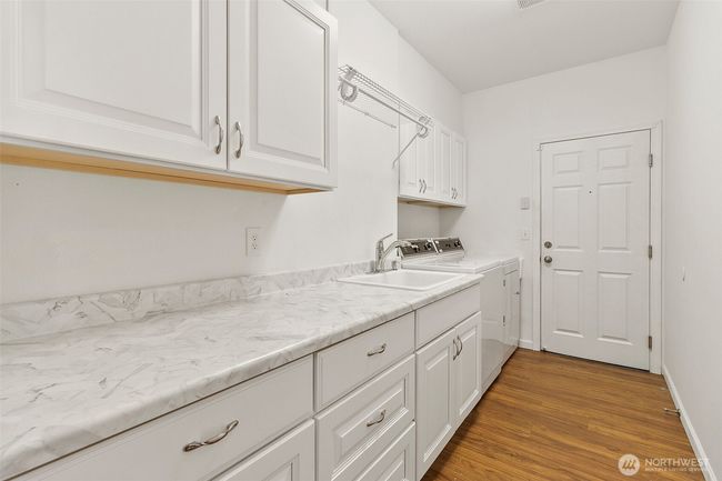 Large laundry/mud room, with direct access to garage. | Image 33