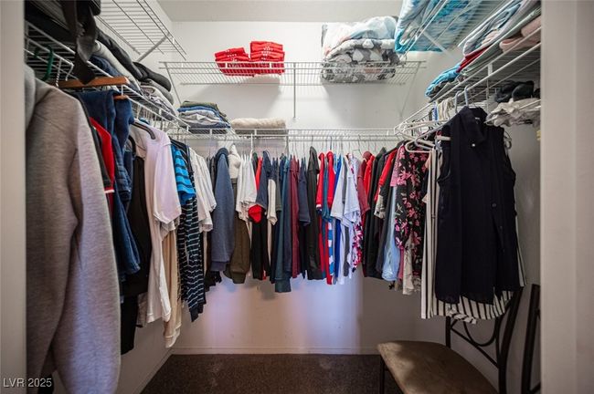 Walk in closet featuring carpet flooring | Image 22