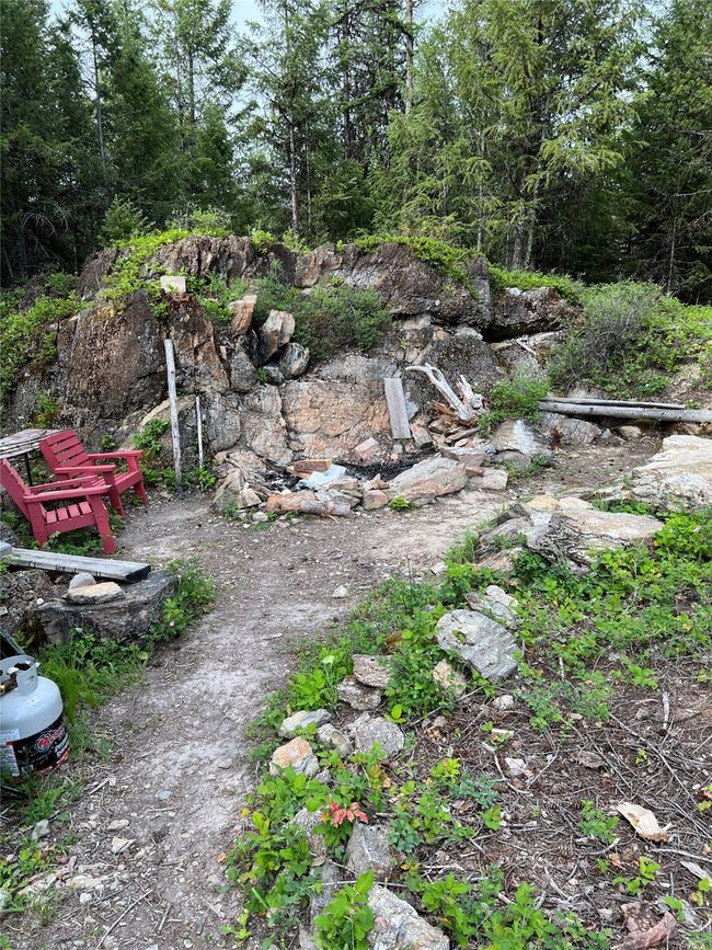 fire pit with rock wall on side | Image 75